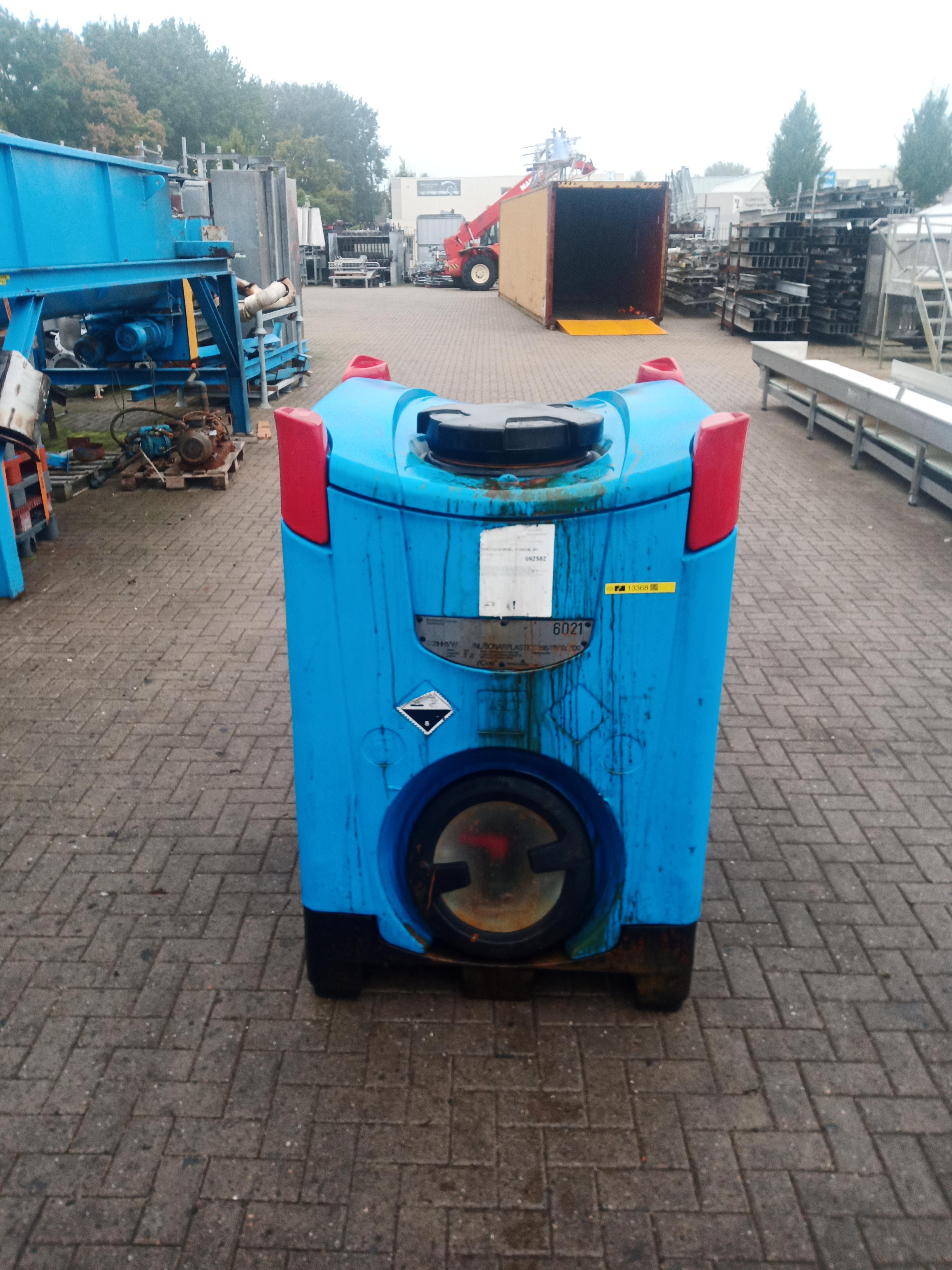 Used Plastic tank with iron(III) chloride