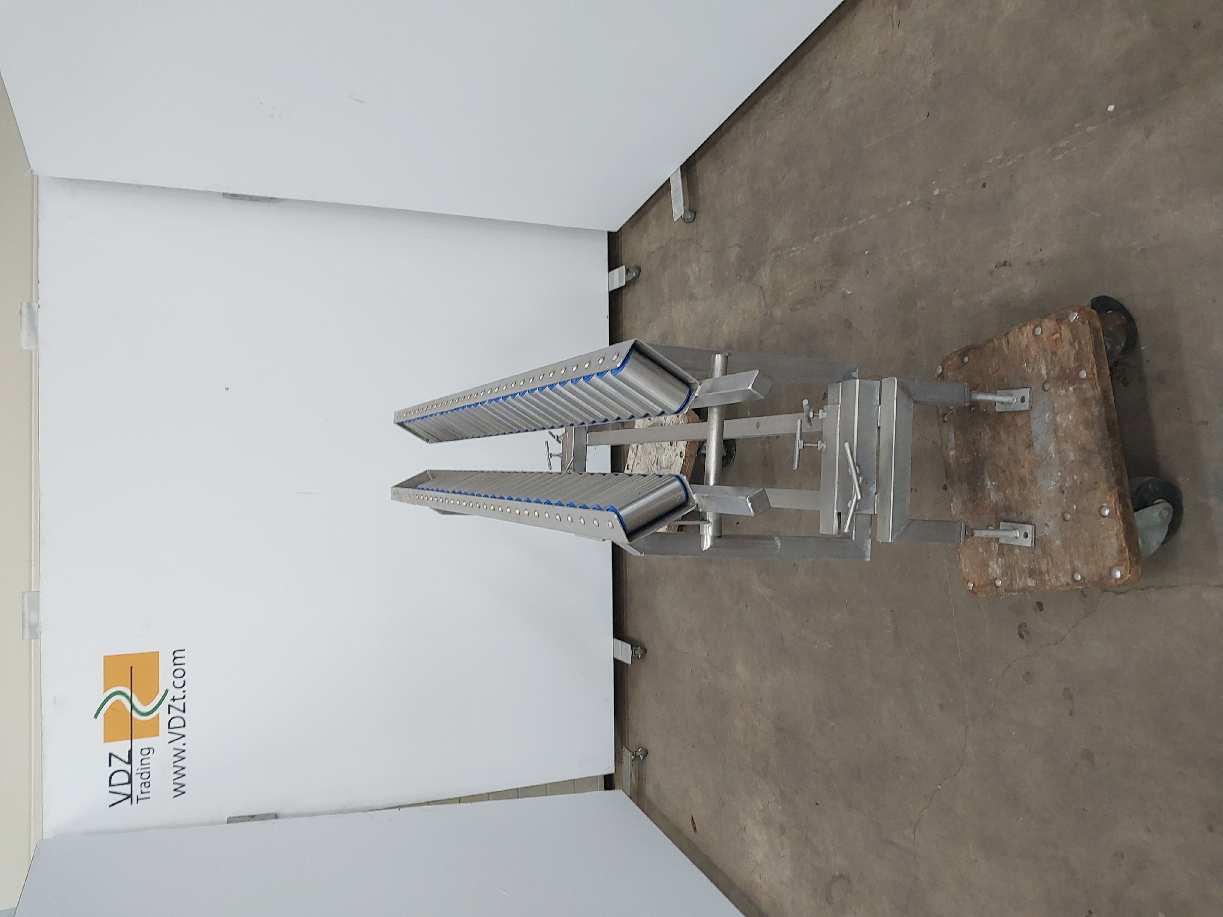 Used Pre-dehiding table with rollers