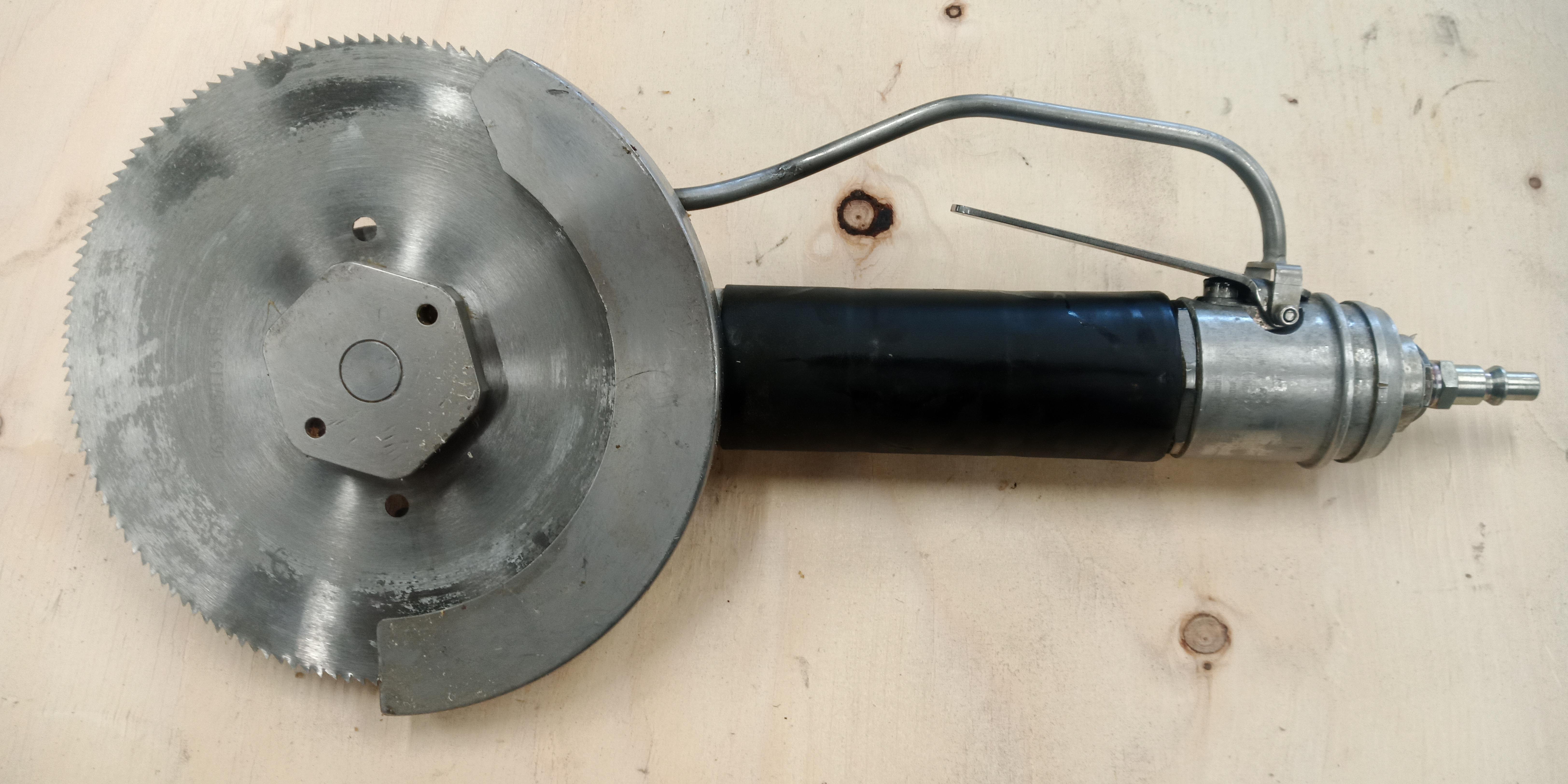 Used Air powered circular saw