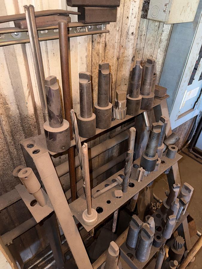 Used SECTION OF (4) TOOL RACK/ TABLES / ROLLING / CART W/ CONTENTS OF RADIAL ARM DRILL PRESS TOOLING & RELATED