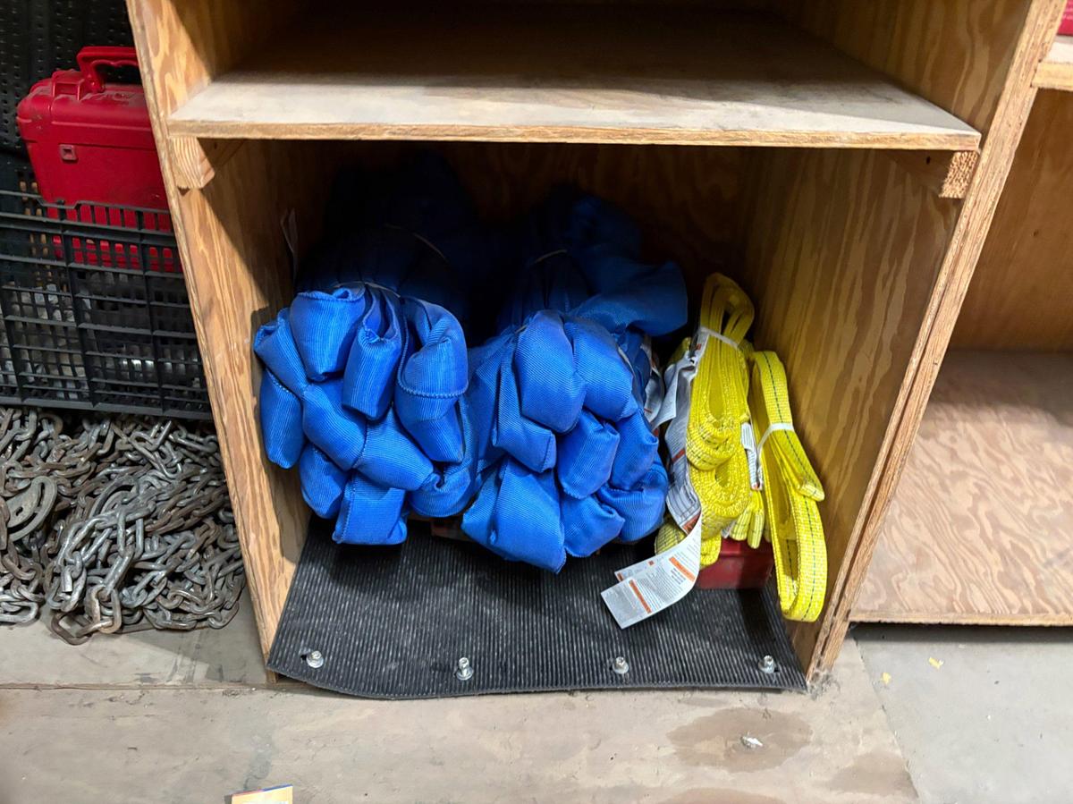 Used 2 shelves of assorted truck parts, tire chains, hand tools, etc