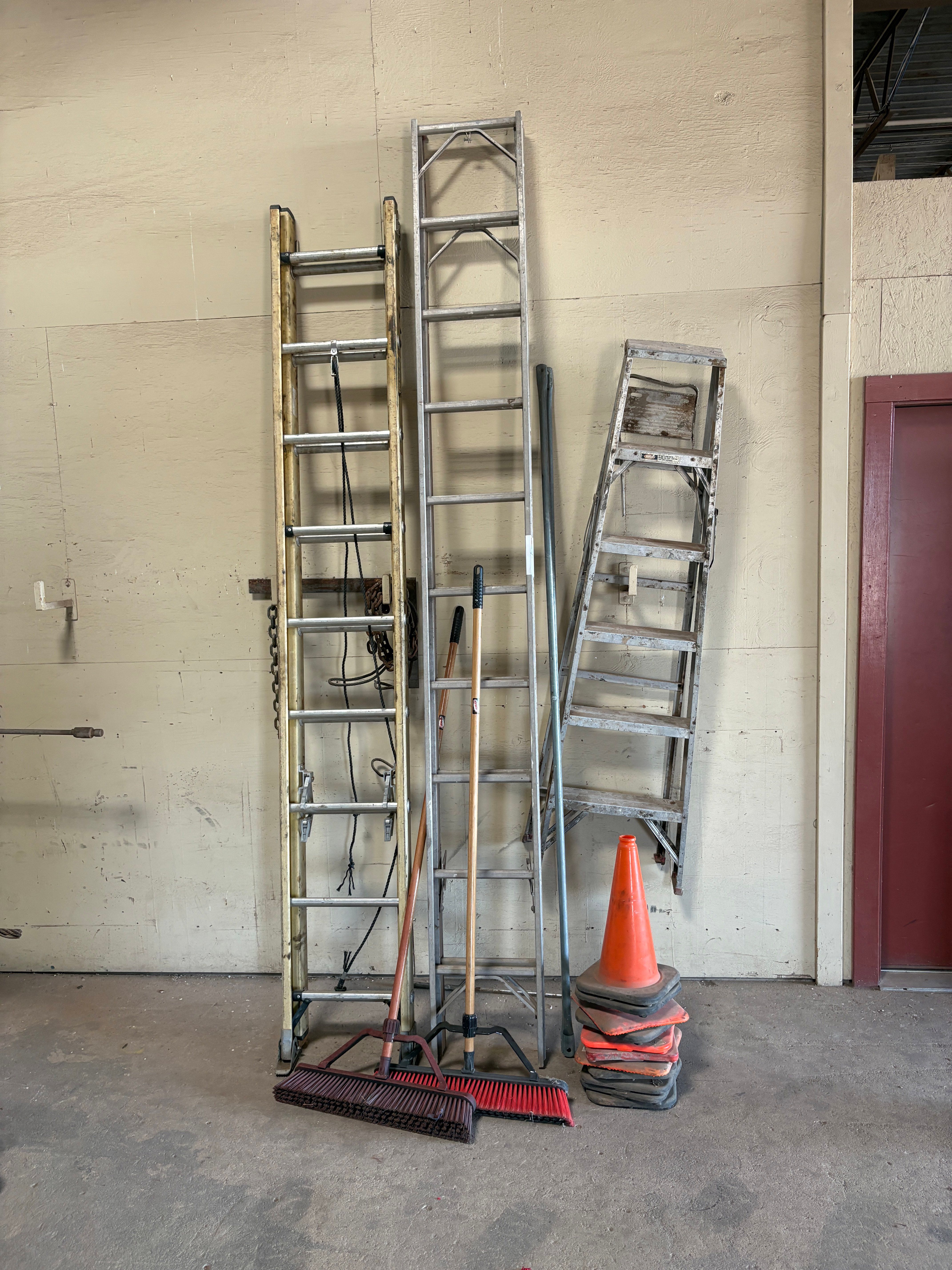 Used (2) extendable ladders, (1) A-frame ladder, push brooms, & traffic cones