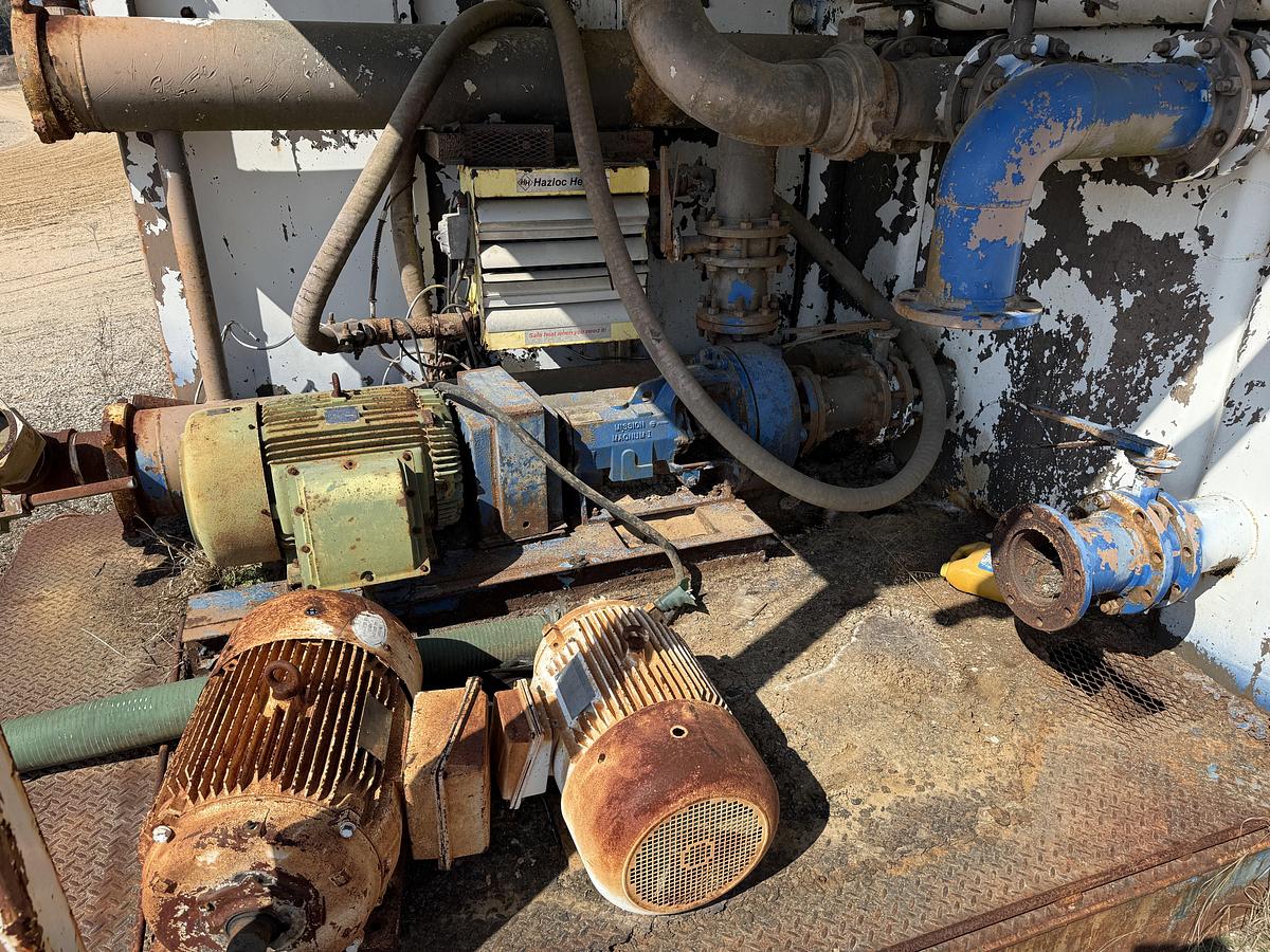 Used 40'L X 7.6'W X 5'H MUD TANK W/ 6X5 CENTRIFUGAL PUMP P/B 50-HP ELECTRIC MOTOR