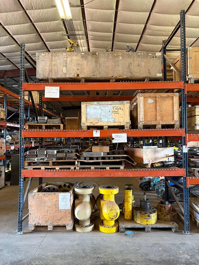 Used Contents of (4 shelves) of assorted frac valve parts