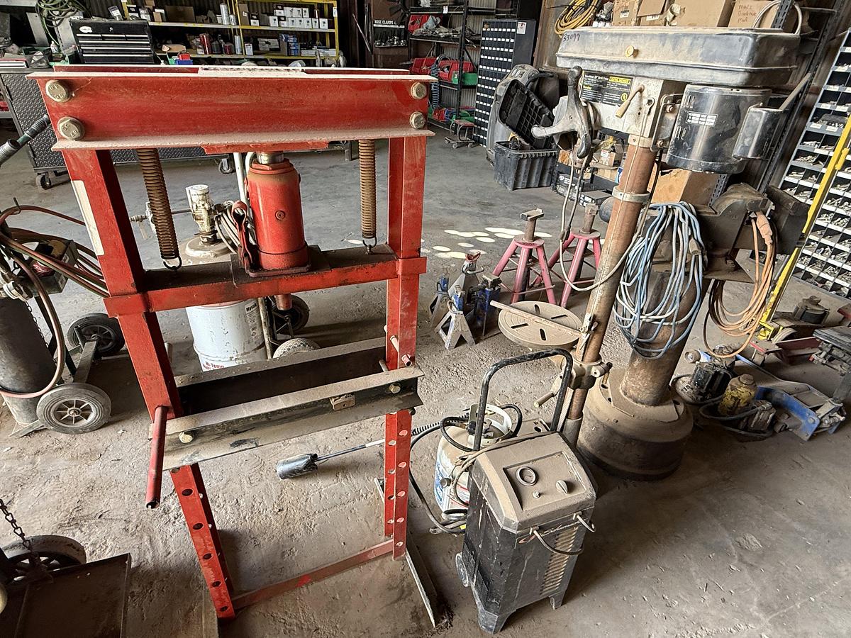 Used (1) WILTON VICE MTD ON STAND, (1) ELECT. 13” DRILL & (1) 20 TON BOTTLE JACK PRESS, (1) PROPANE BOTTLE & TORCH, BATTERY CHARGER