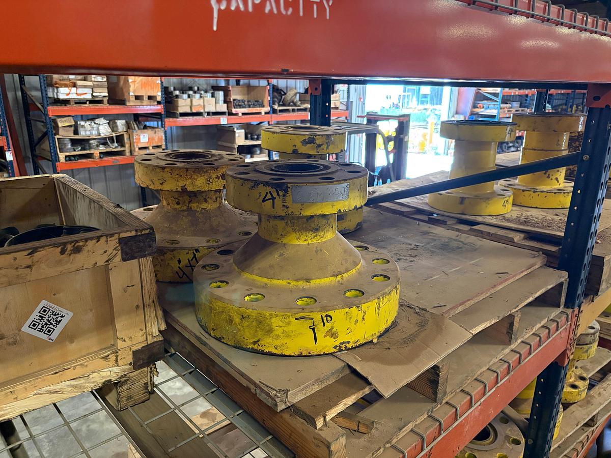 Used (4 shelves) of assorted single stud adapters, 4” to 7” spools, hydraulic valve actuators, etc