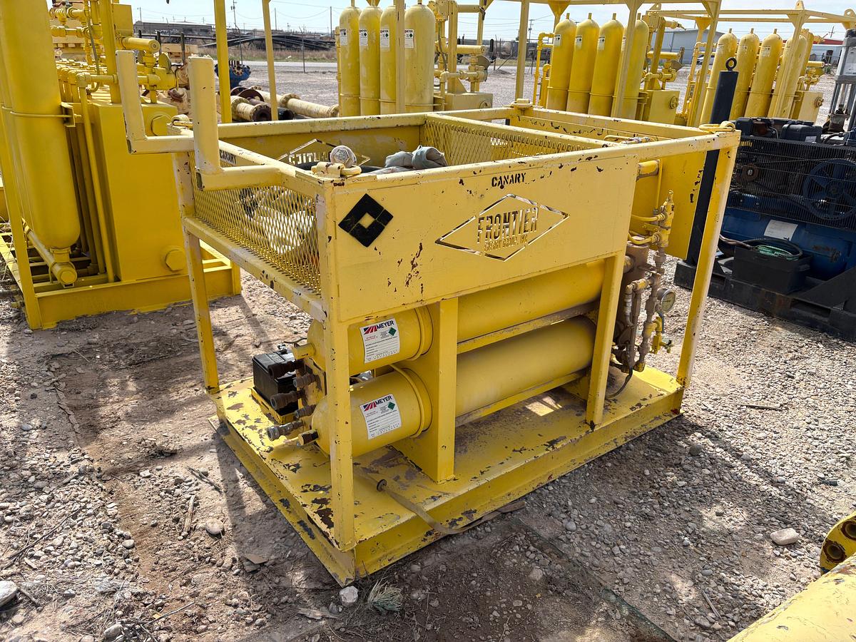 Used Frontier 3-station closing unit, skidded