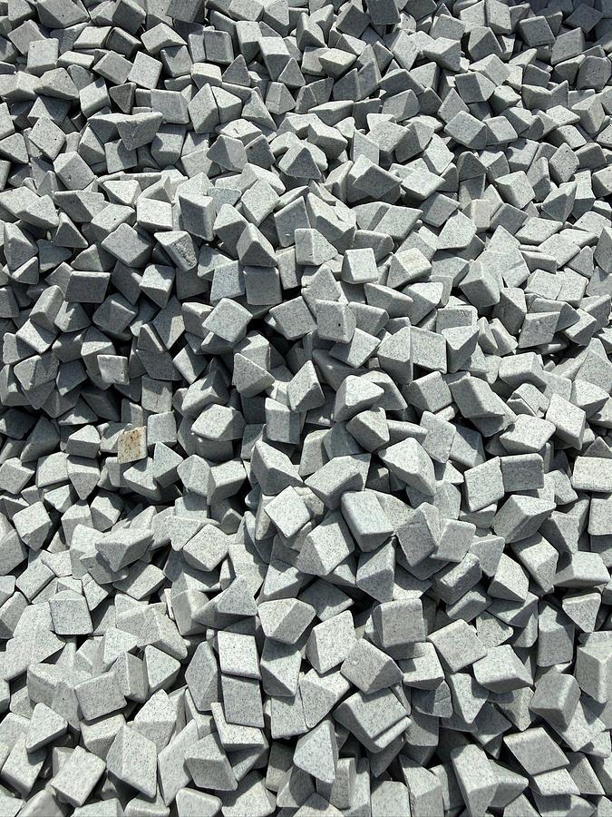 Used (3) 55 gallon drums of Triangular Ceramic Abrasive Polishing Tumbling Media. Approximately 700 lbs. in each drum.