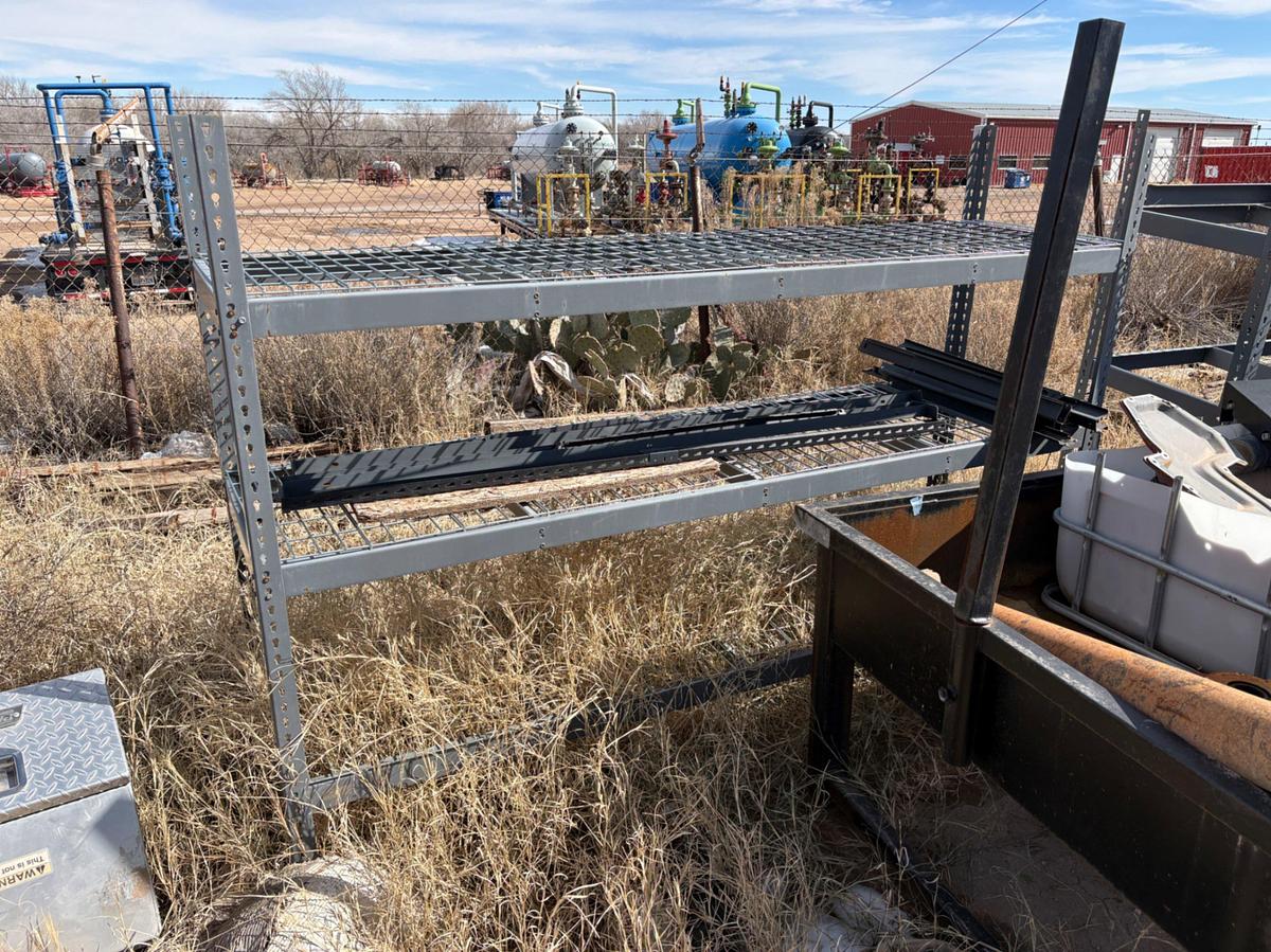Used Lot of shelving units, tool storage table, grill guard, assorted engine parts, etc