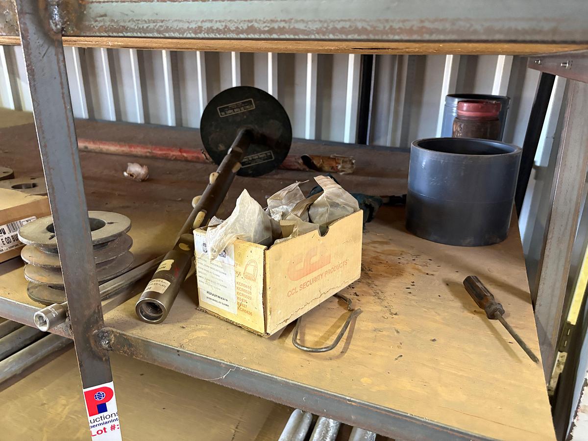 Used Contents of (5) shelves w/ U-line oil spill pads, various 2” to 4” PVC pipe fittings, etc.