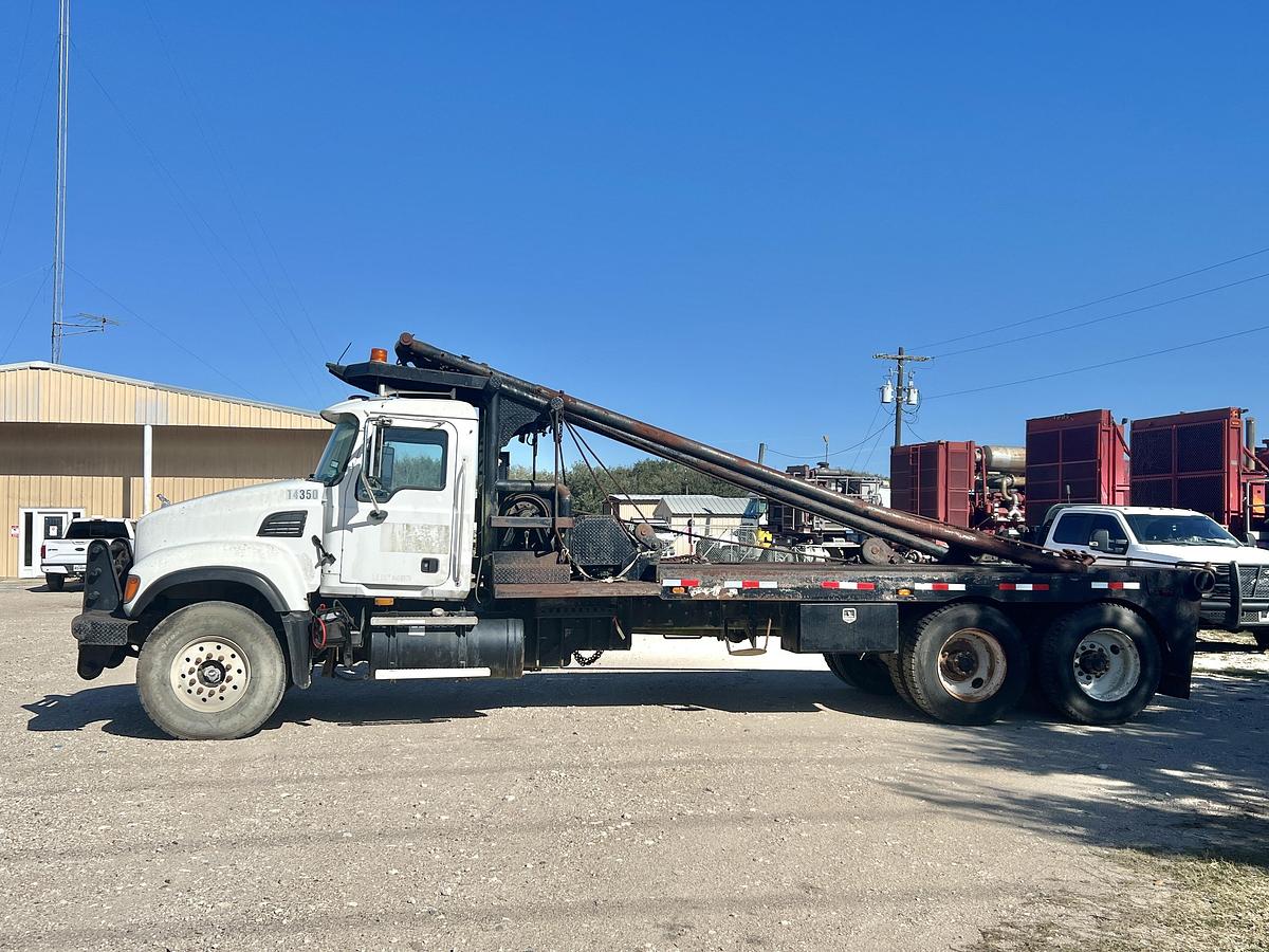 Used 2007 MACK CV713 T/A 65K GIN POLE WINCH TRUCK