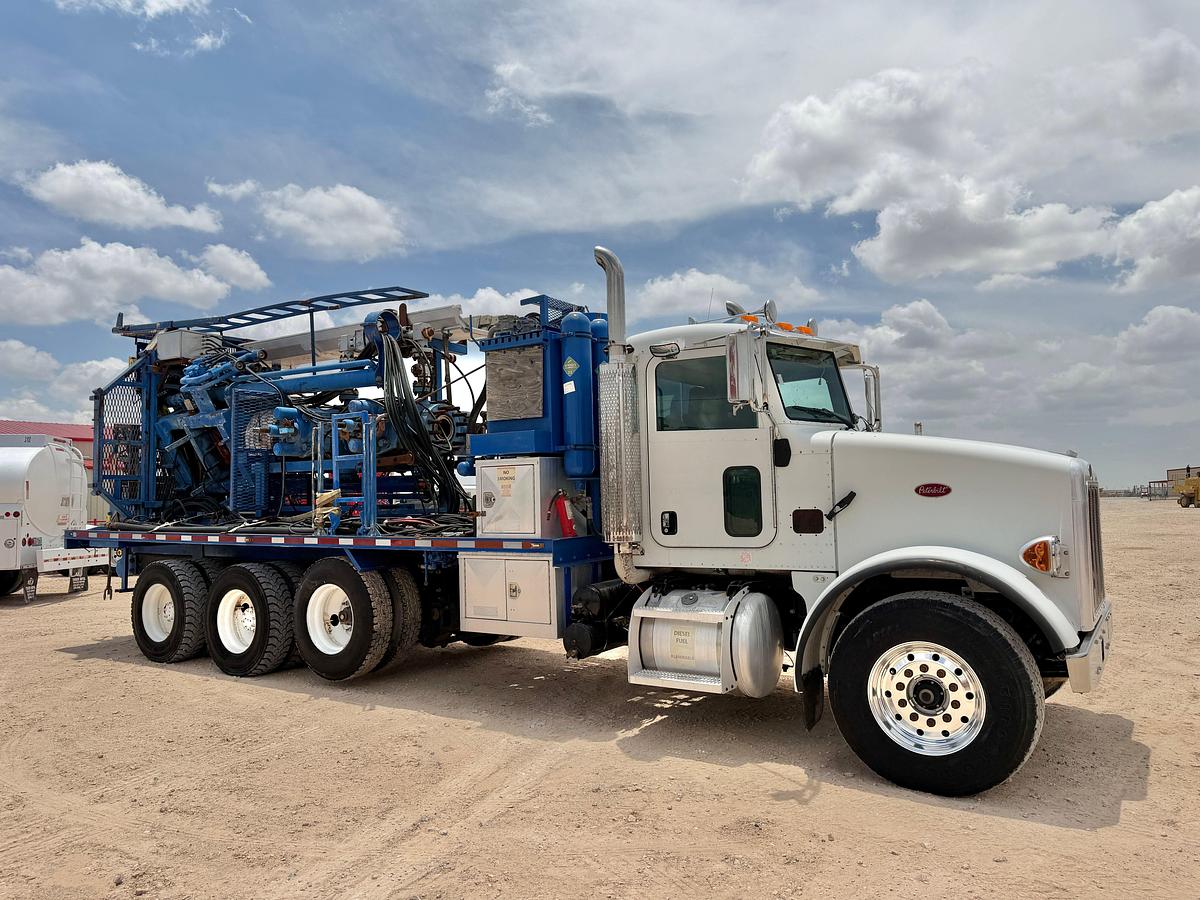 Used Pro Fab Snubbing Unit mtd on 2007 Peterbilt 357 3-axle daycab truck