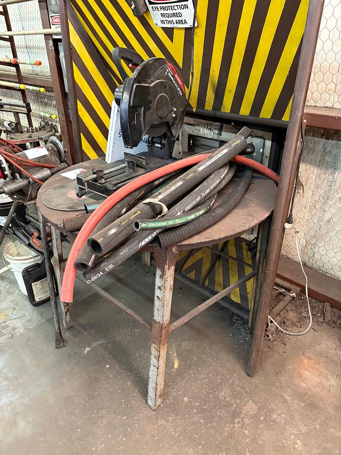 Used 4’Dia x 3’ metal shop table w/ drill master 14” industrial cut off saw
