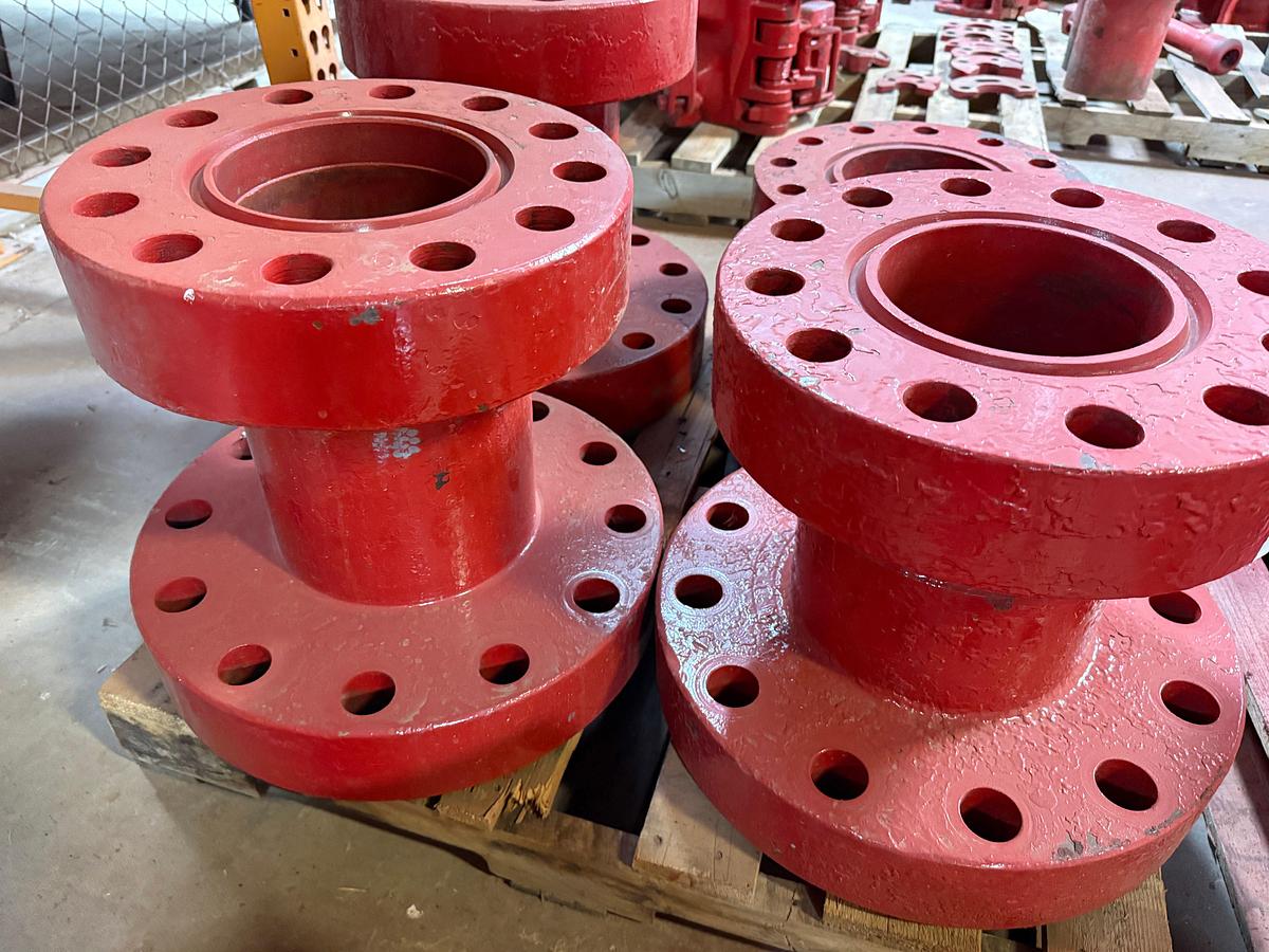 Used PALLET W/ (4) 7-1/16” WELL HEAD ADAPTER SPOOLS