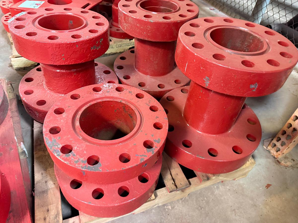 Used PALLET W/ (4) 7-1/16” WELL HEAD ADAPTER SPOOLS