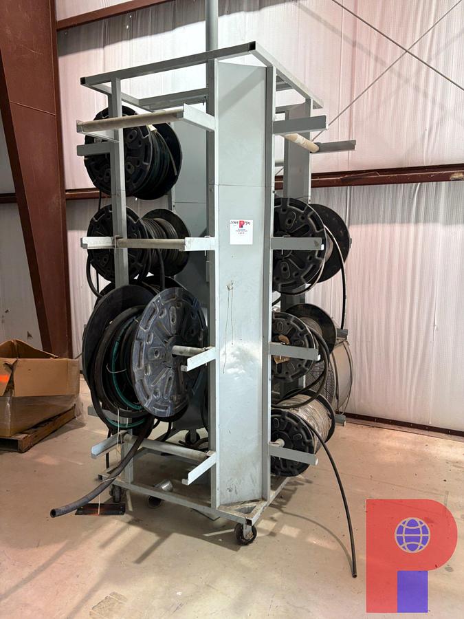 Used PARKER 5.5’ X 5.5’ X 8.5’ PORTABLE SPOOL RACK W/ ASSORTED HOSES