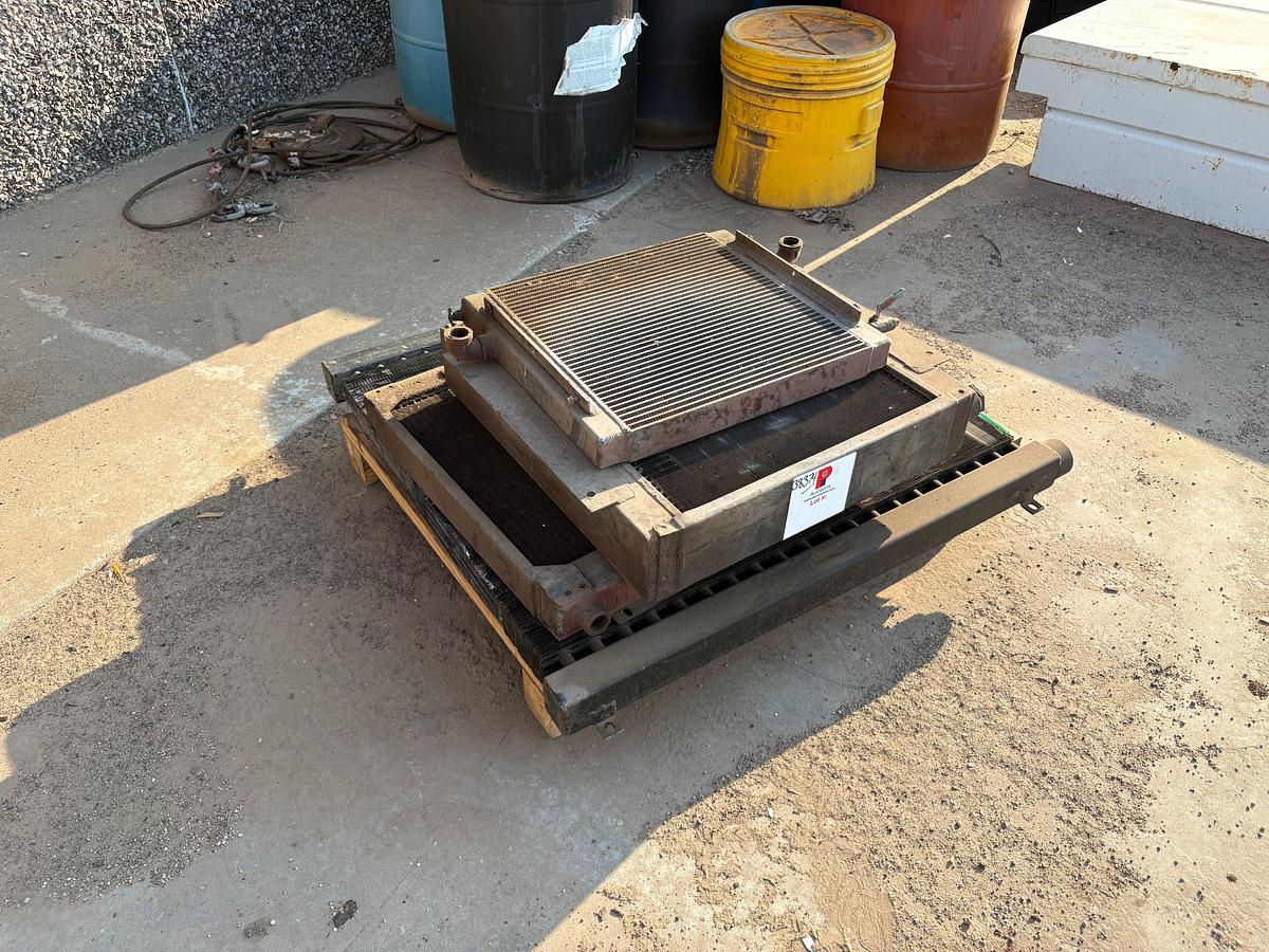 Used (4) assorted size oil coolers/radiators
