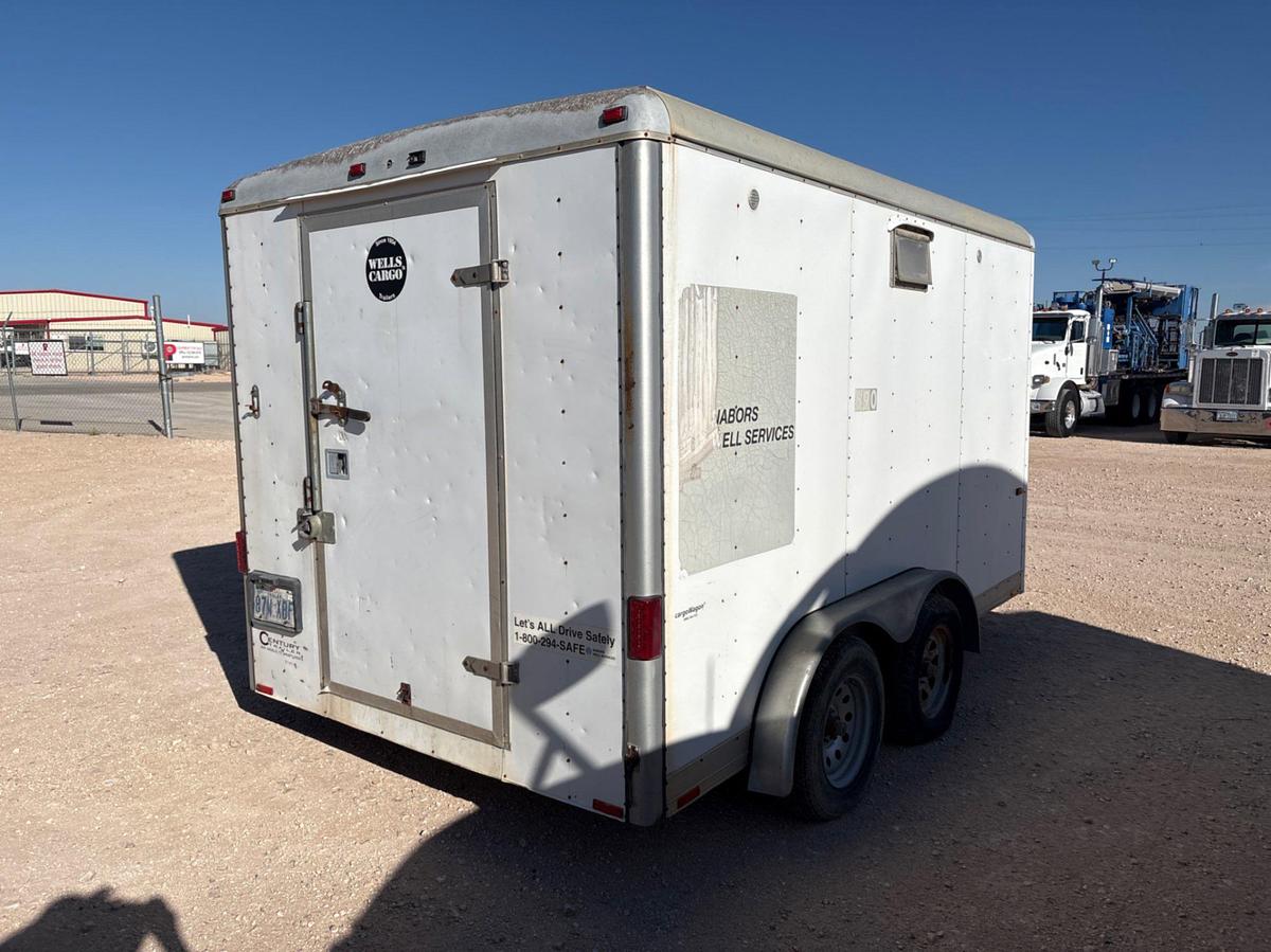 Used Wells Cargo 12’ X 7’ t/a bumper pull doghouse trailer