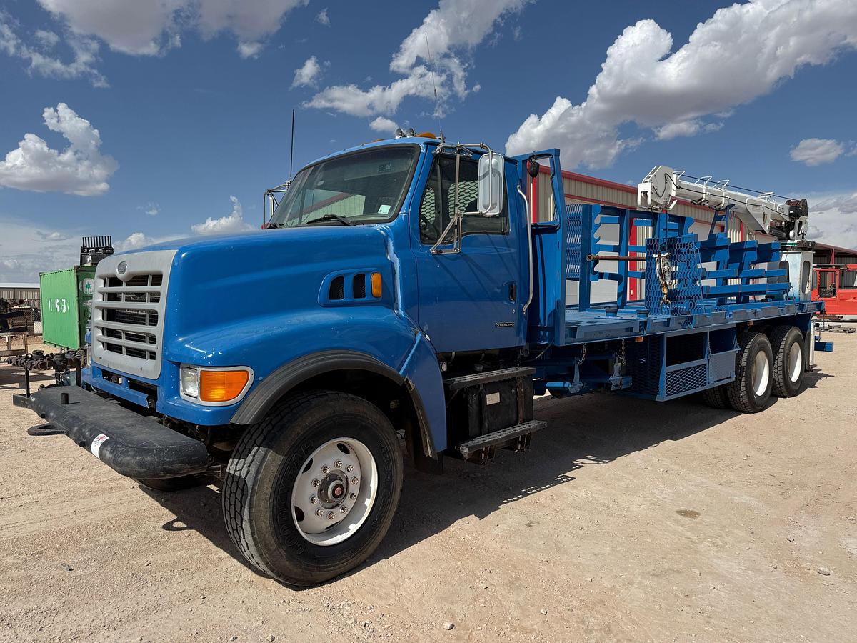 Used 2002 STERLING LT9500 T/A 24’ FLATBED FLOW IRON CRANE TRUCK