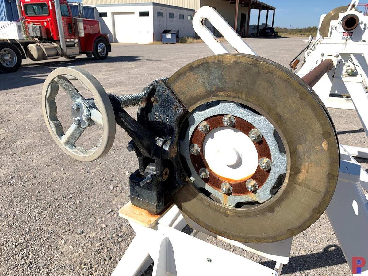 Used 66”W X 48”H REEL STAND W/ ADJUSTABLE 16” BRAKE CALIPER
