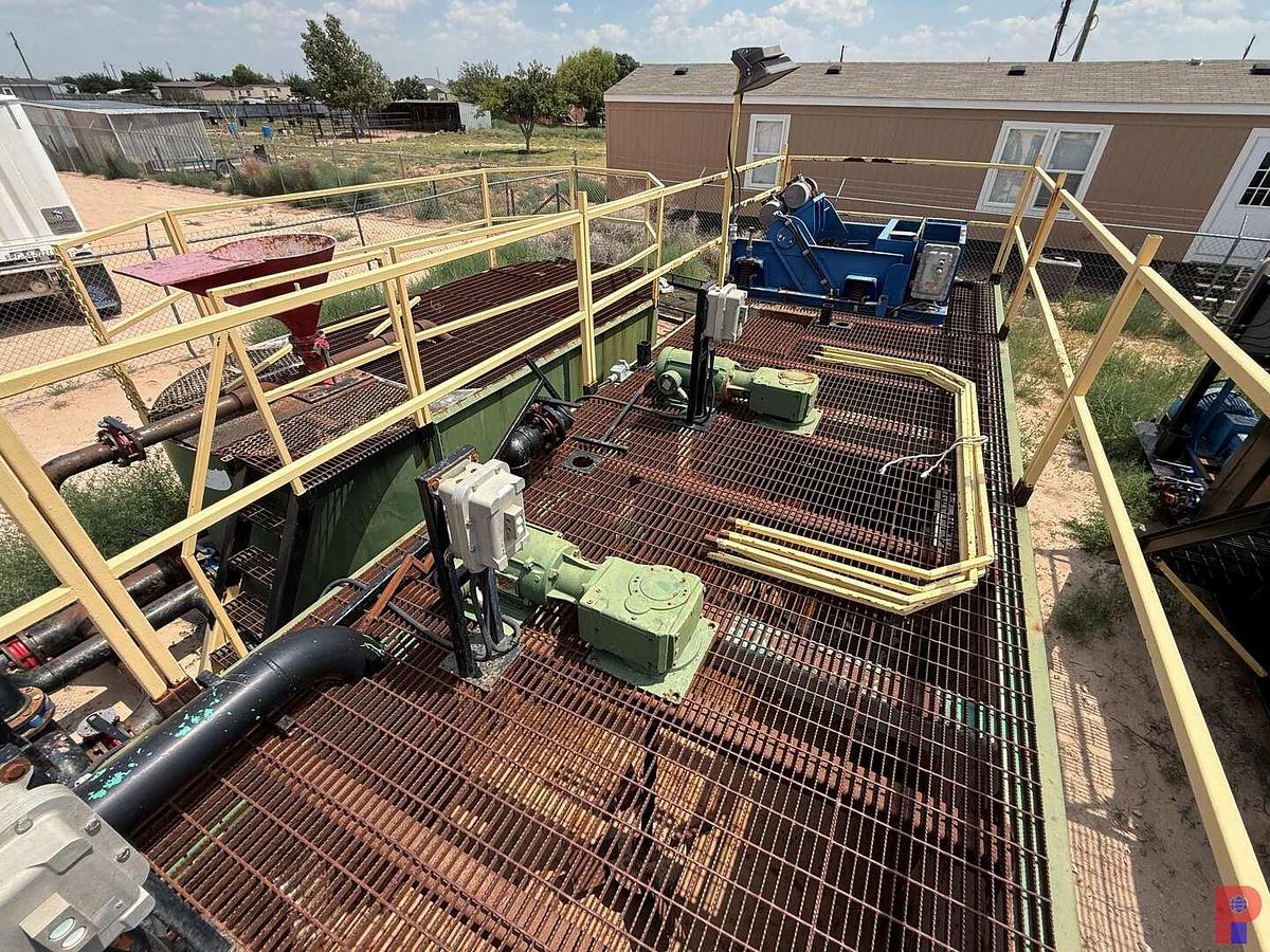 Used 30’L X 8’ W X 5.8’ 3-COMPARTMENT 180 BBL. MIXING TANK P/B (2) 75 HP ELECTRIC MOTORS