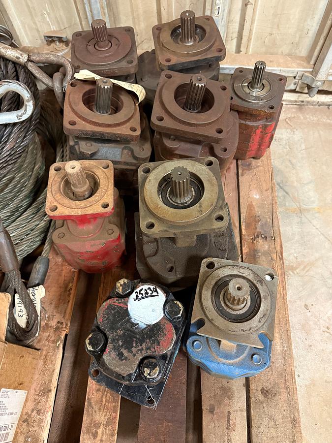 Used ROW OF (9) ASSORTED DIRECT MOUNT SPLINED HYDRAULIC PUMPS