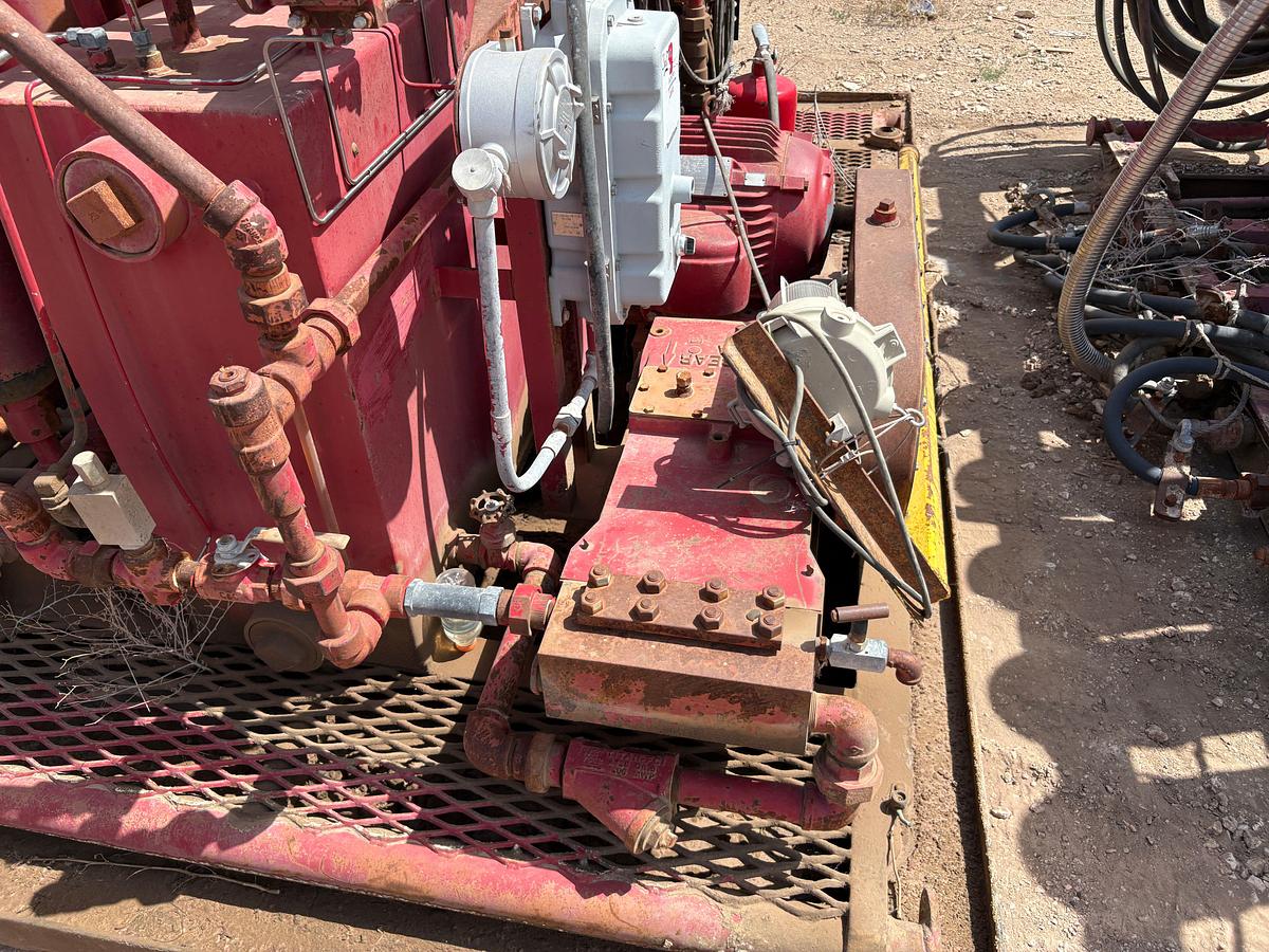 Used 6-station closing unit, skidded