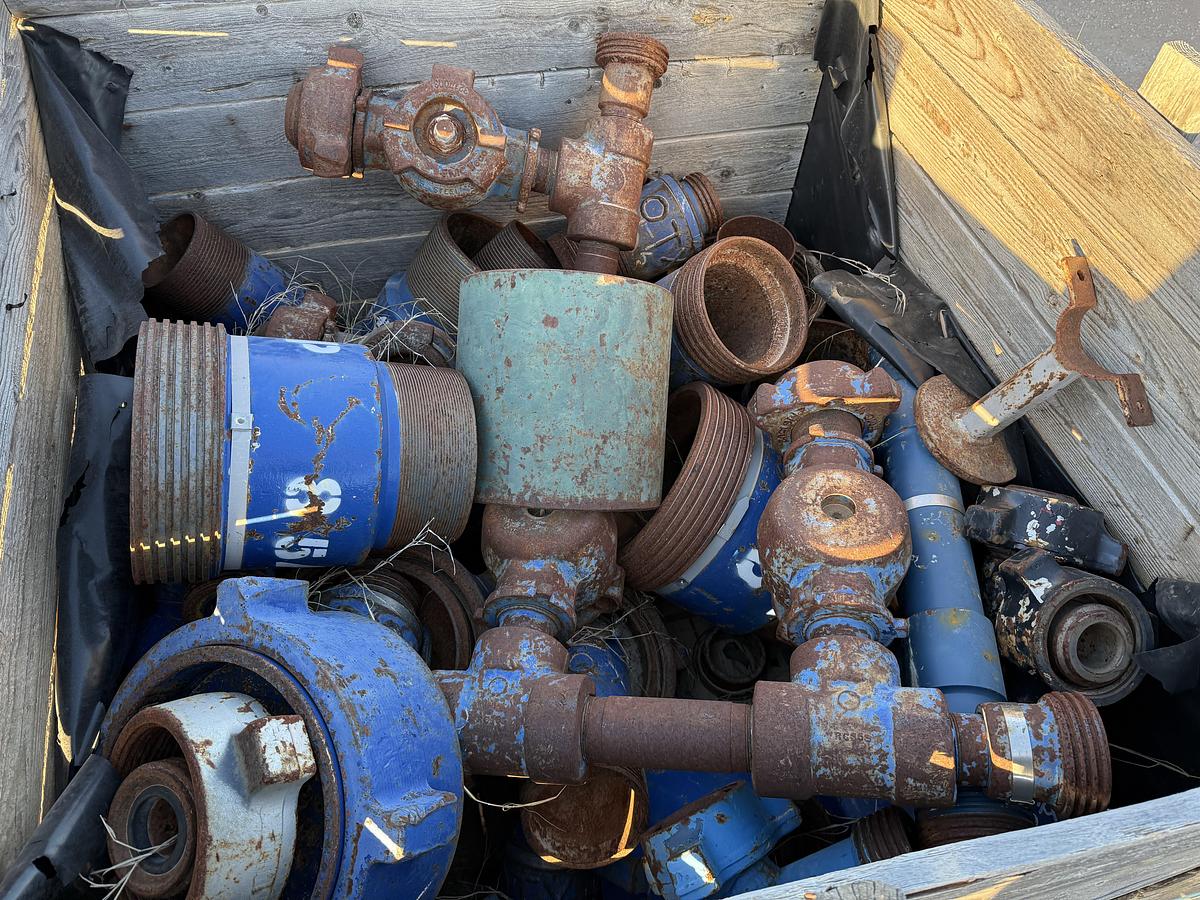 Used (1) TOTE & (1) CRATE W/ VARIOUS 2” & 3” FLOW IRON & CEMENT HEAD CONNS, CROSS OVERS, SUBS, PLUG VALVES, CHIKSANS, & RELATED
