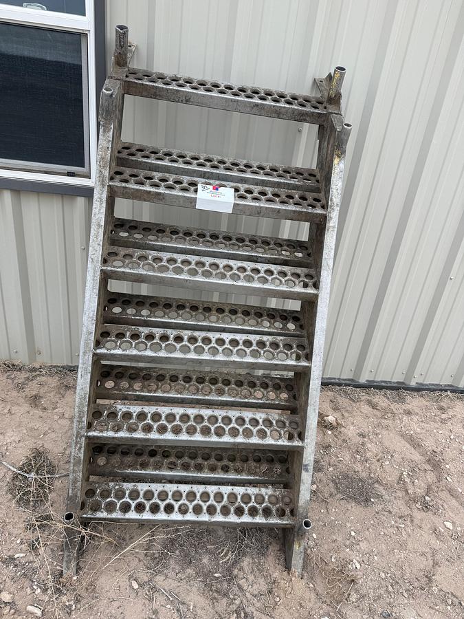 Used (1) 12' EXTENDABLE ALUMINUM, (1) 15' ALUMINUM, & (2) 15' STEEL W/ HAND RAILS RIG LADDERS