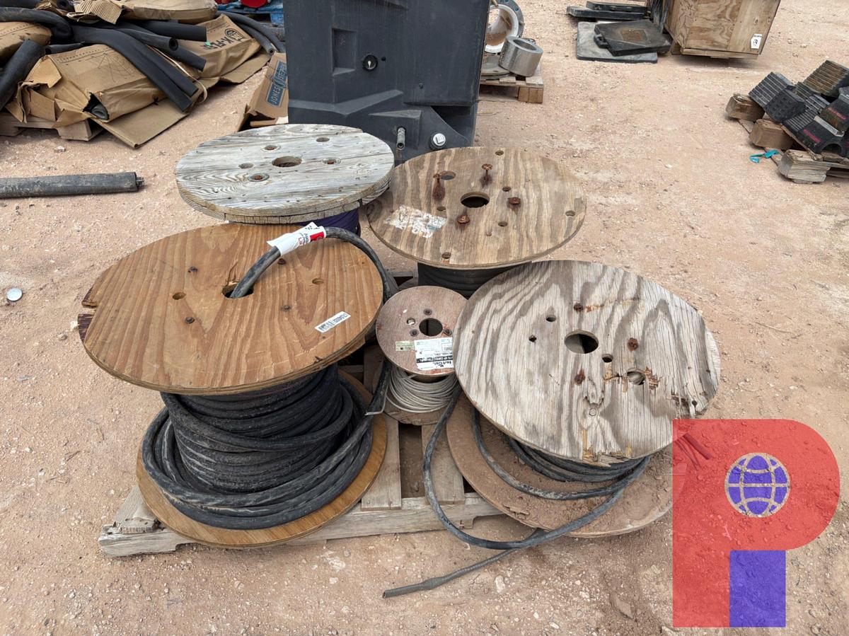 Used (3) PALLETS & (1) SPOOL RACK W/ ASSORTMENT OF ELECTRIC CABLES