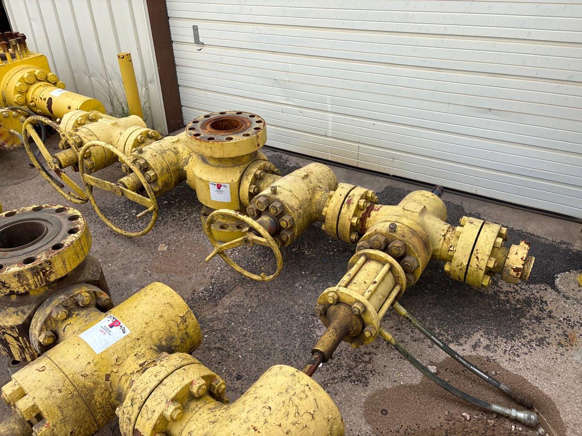 Used 7-1/16” x 4” fluid cross w/ (4) 4” 10k gate valves