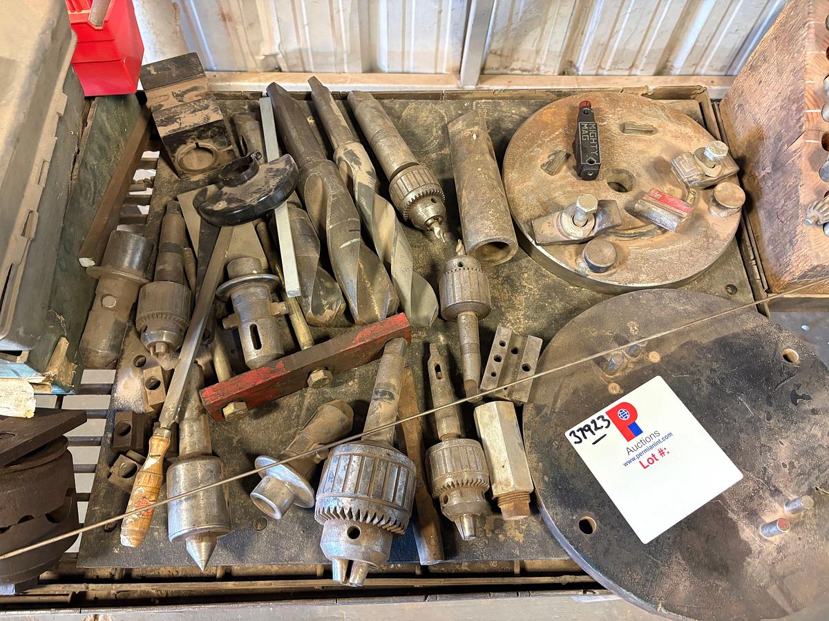 Used 37” x 26” x 34” table w/ assorted drill press chucks, drill bits, tap & dies, & assorted bolts