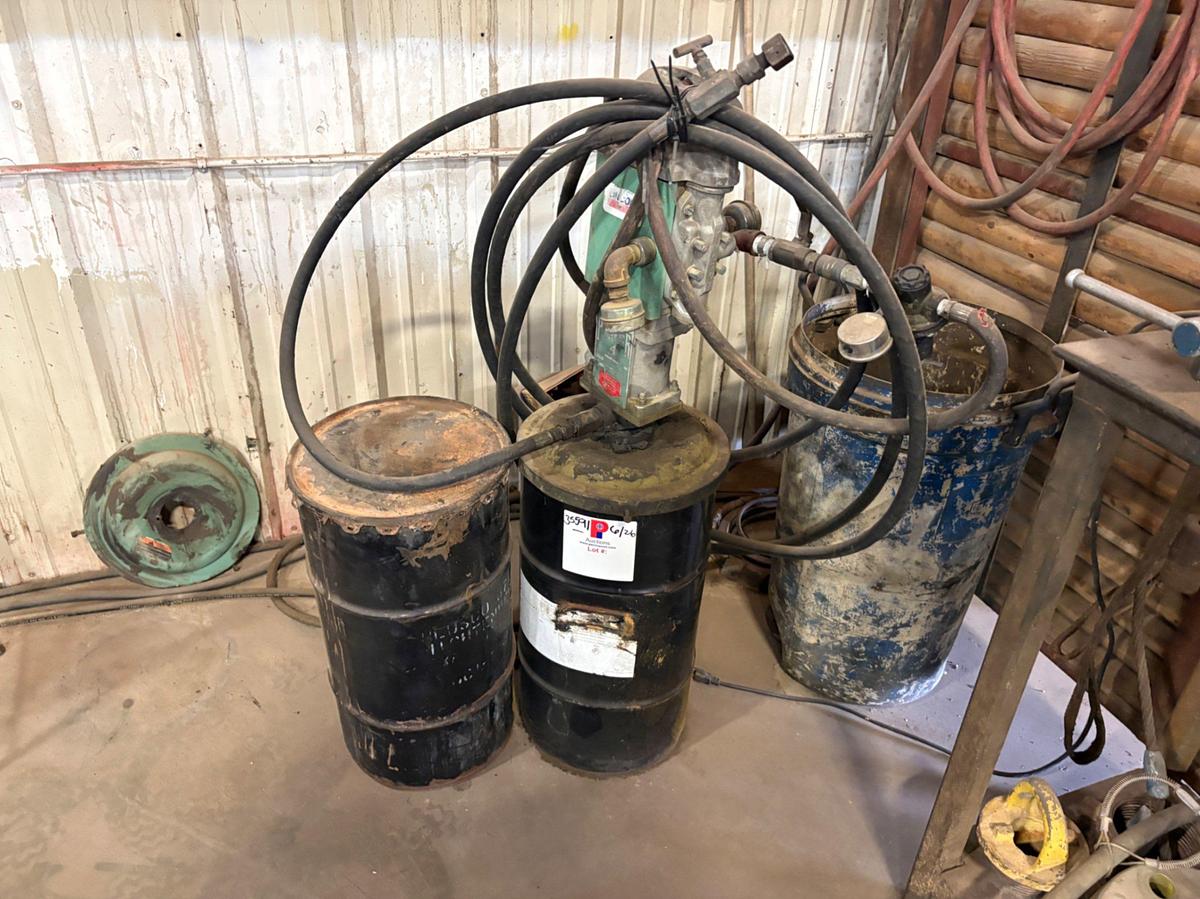 Used Lincoln power master 4 air motor/grease pump w/ (2) barrels of high temp grease