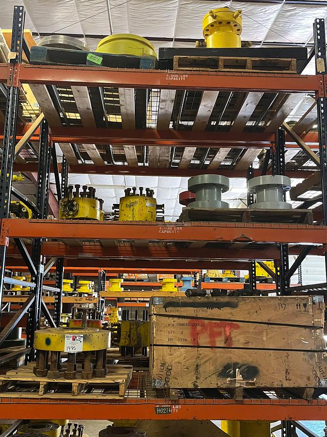 Used Contents of (5 shelves) w/ esp flange equipment, blind flanges, soda blast media, single stud adapters, (1) Braden head, etc