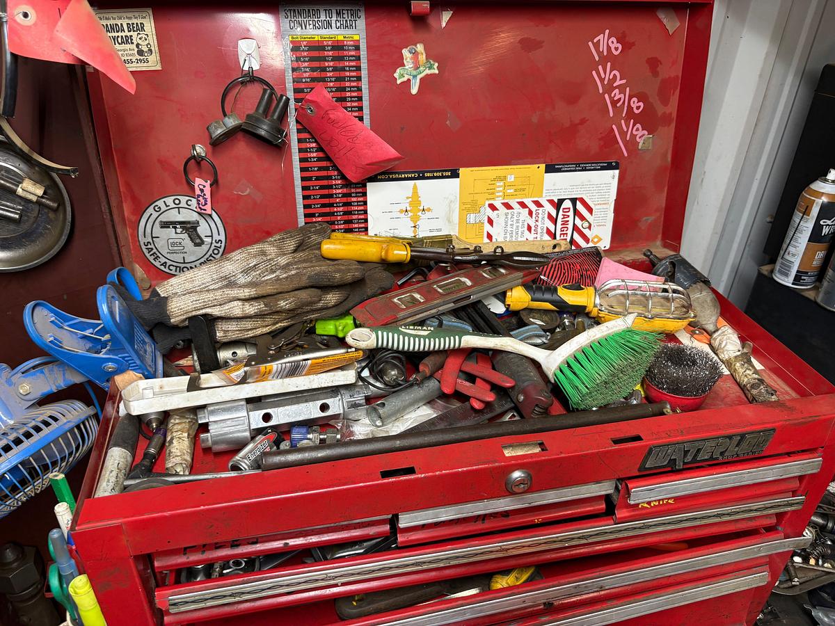 Used 64” x 40” x 41” metal shop table w/ contents