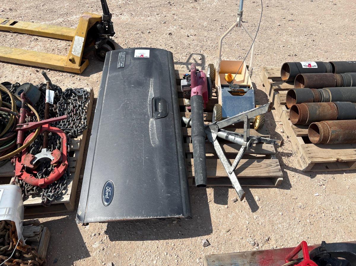 Used (3 pallets) w/ assorted chains, oxygen/acetylene hoses, F-250 super duty tailgate, leaf blower, pallet jack, etc