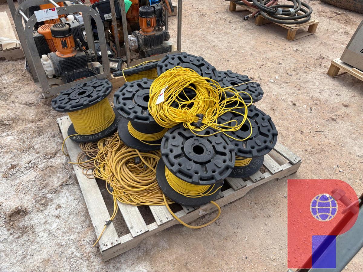 Used (3) PALLETS & (1) SPOOL RACK W/ ASSORTMENT OF ELECTRIC CABLES