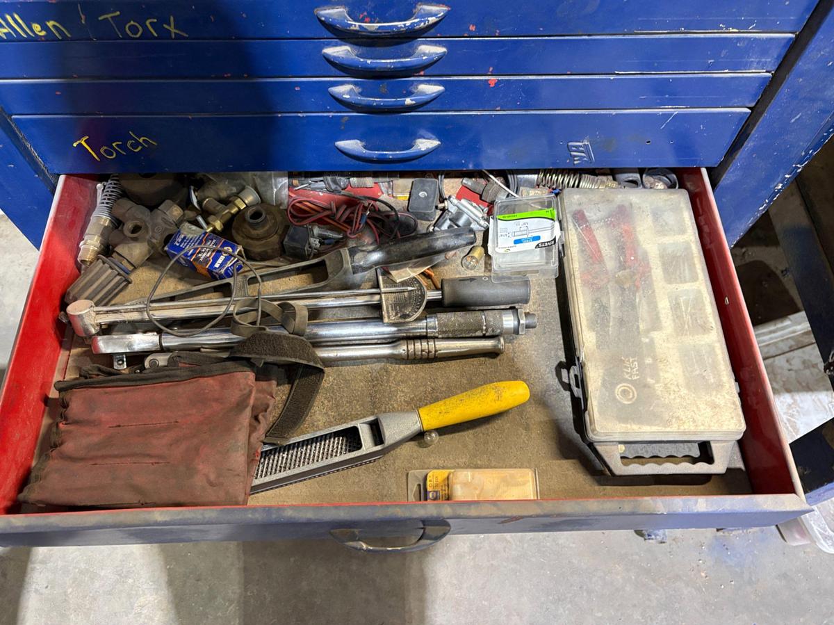 Used 34” x 18” x 60” tool box w/ contents
