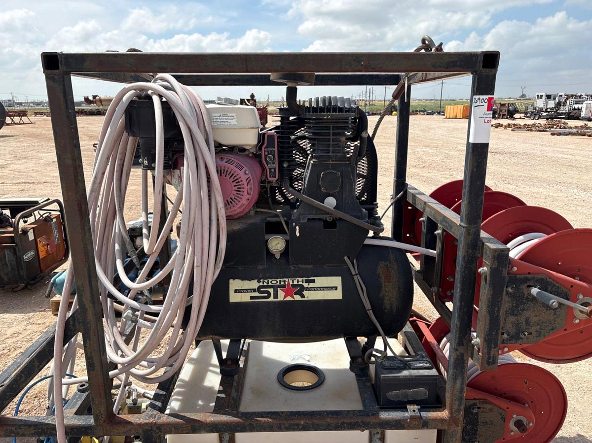 Used North Star air compressor w/ poly tank, hose reels, & pneumatic pumps