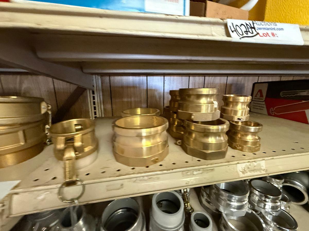 Used 2ND SHELF W/ (25+) 2” THRU 4” CAMLOCK BRASS FITTINGS