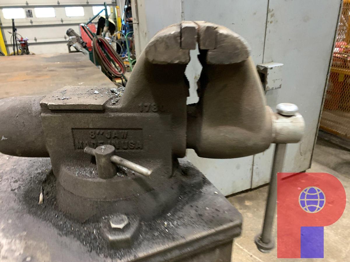 Used 8’ X 4’ STEEL TABLE W/ 8’ X 4’ BOTTOM SHELF W/ 8” JAW VICE