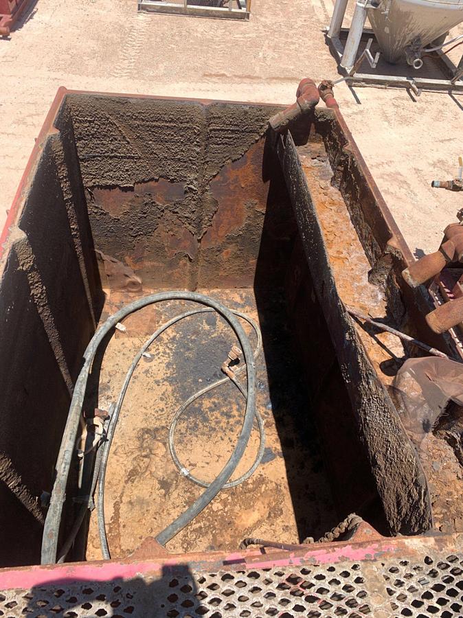 Used 21’ L x 9’ W x 8’ T 115 Bbl Open Top Skidded Tank