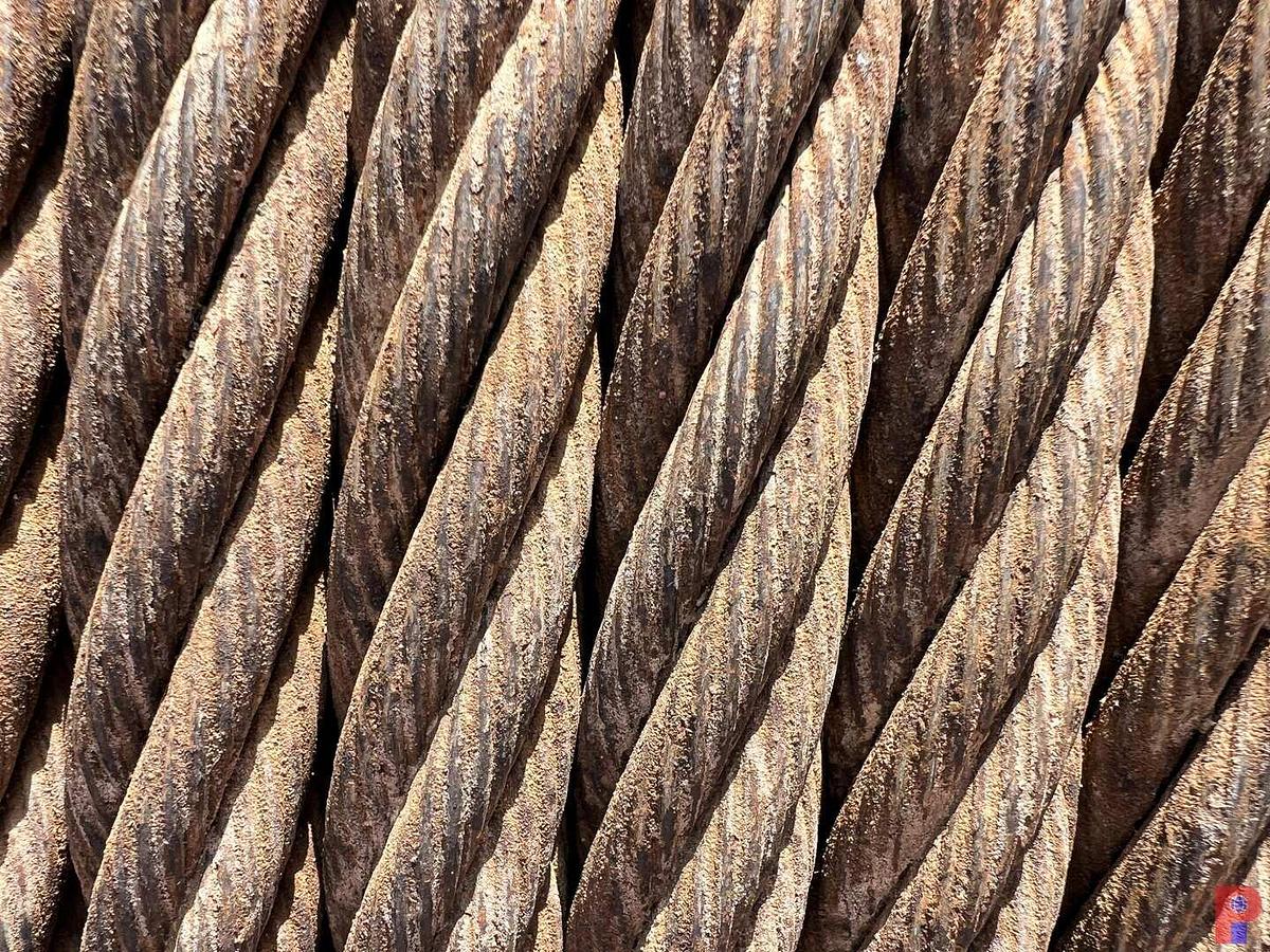 Used SPOOL STAND WITH 5’6” DIAMETER SPOOL 1/4 FULL OF 1” DRILL LINE