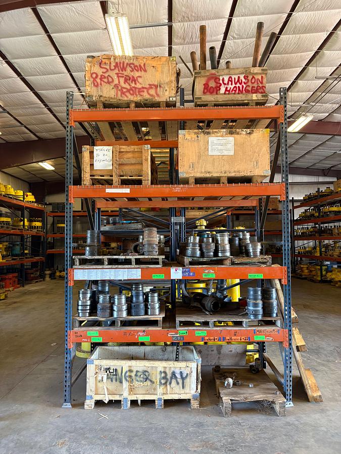 Used 8.5’ x 4’ x 14’ pallet rack shelving w/ (9 pallets) of assorted bop tubing hangers