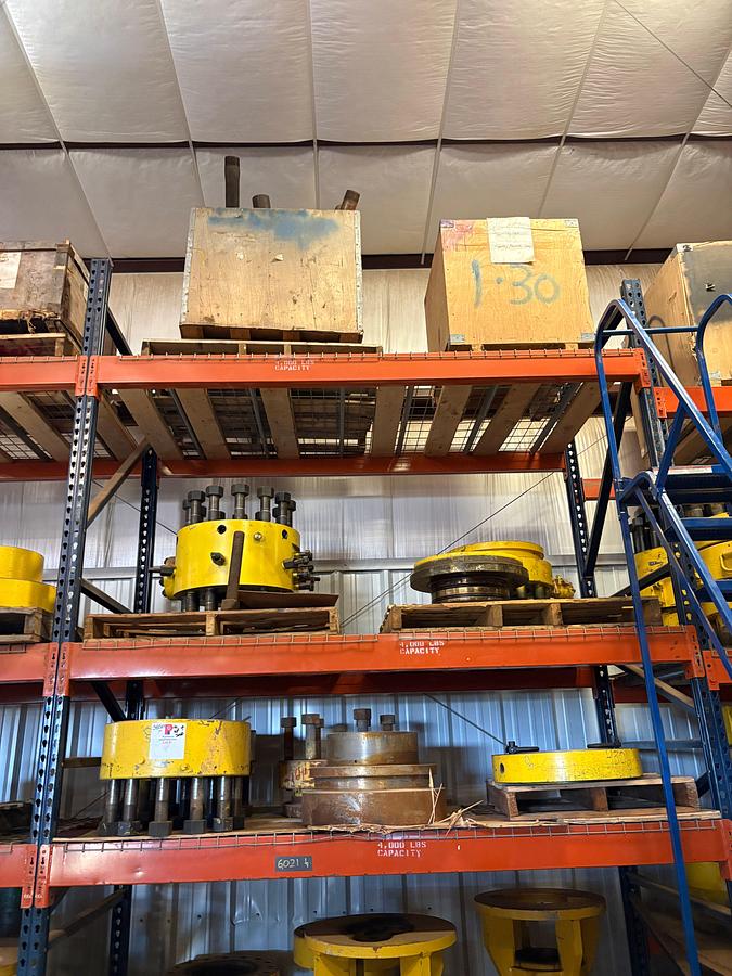 Used Contents of (3 shelves) w/ DSAs, tubing hangers, casing head components