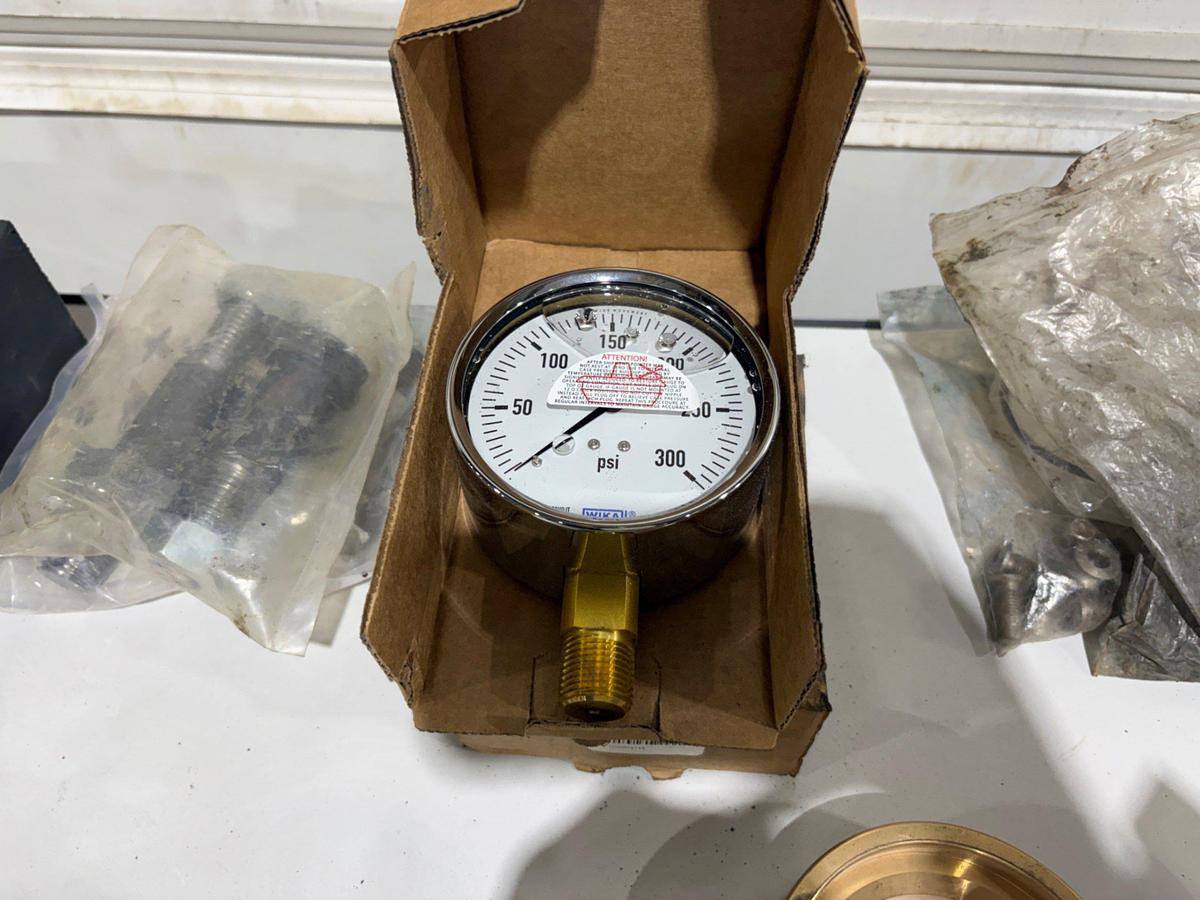 Used Shelving unit w/ (UNUSED) XK-90 & Logan swivel parts, stabbing guides, Kelly valve kits, guages, etc