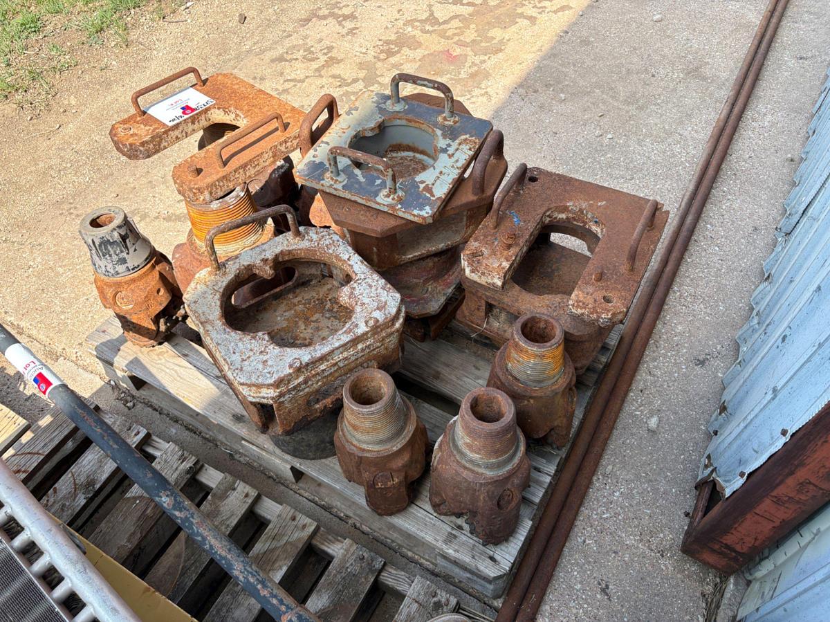 Used (6) assorted size tricone drill bits & (8) assorted bit breakers & slip plates