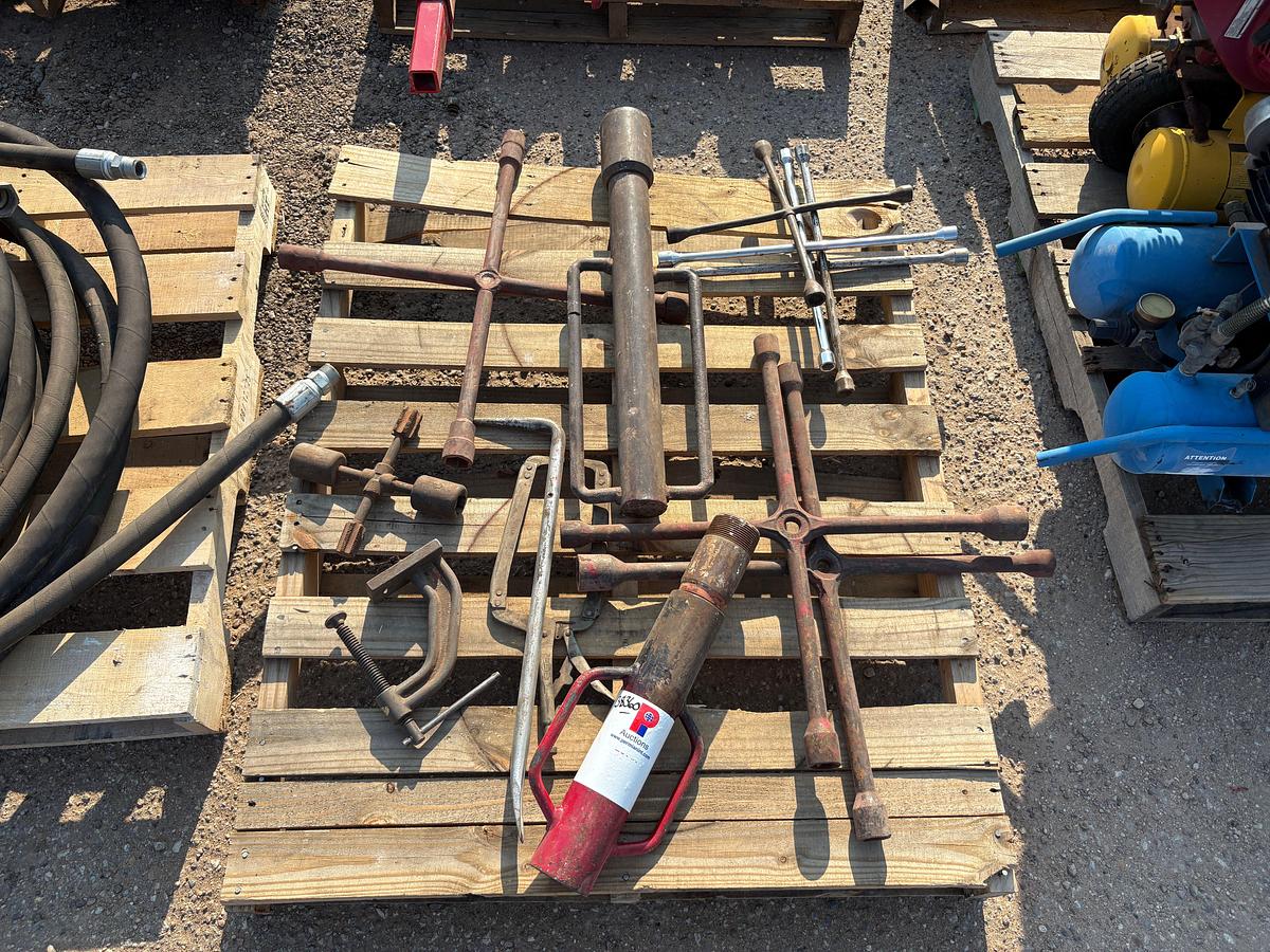Used (2 pallets) w/ 4-way lug wrenches, winch fairlead, T-post drivers, c-clamps, etc
