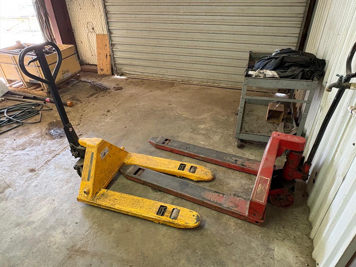 Used (2) pallet jacks & (1) rolling tool cart