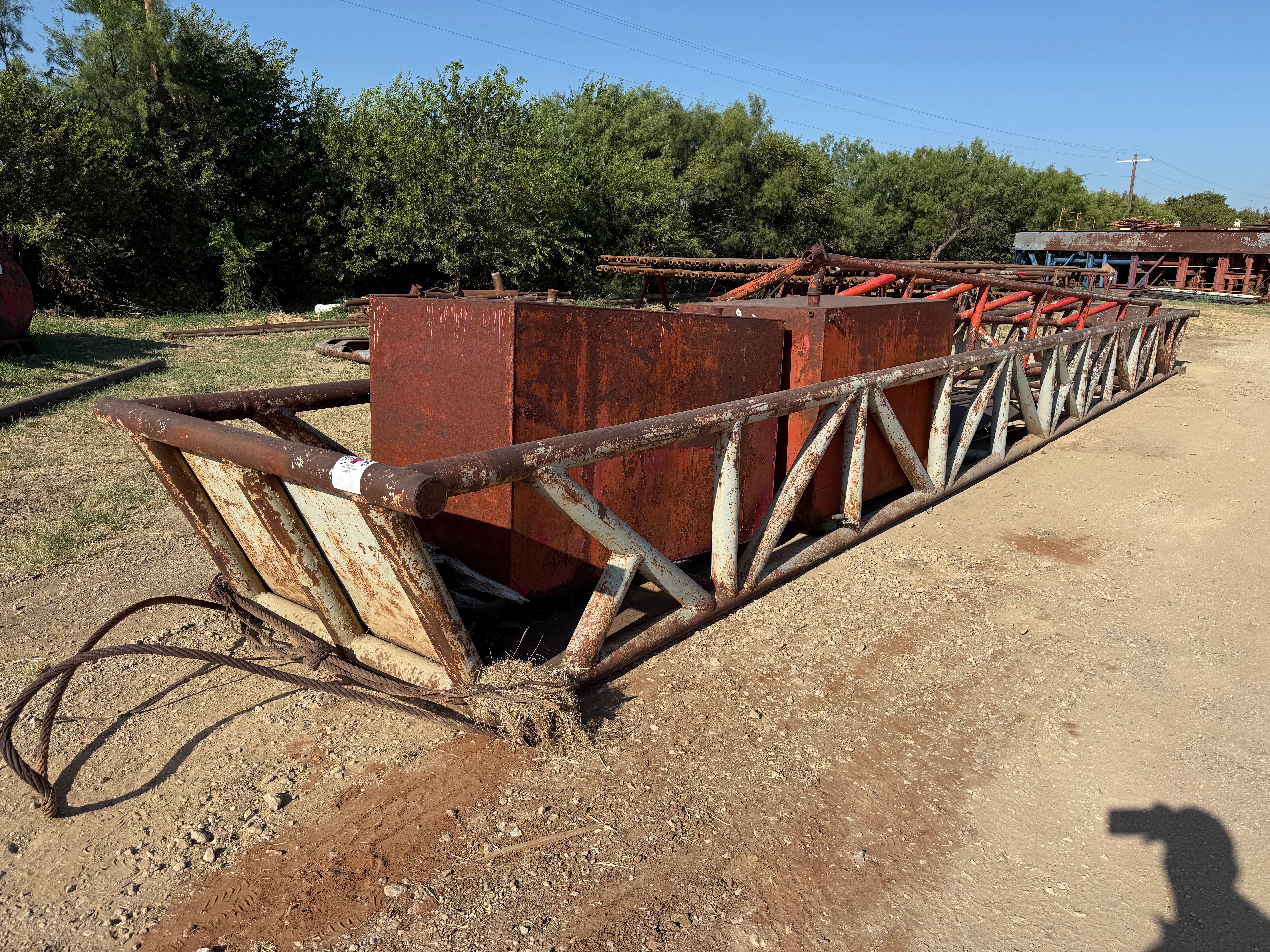Used 50’ x 5’ x 3’ SKIDDED PIPE TUB W/ CONTENTS